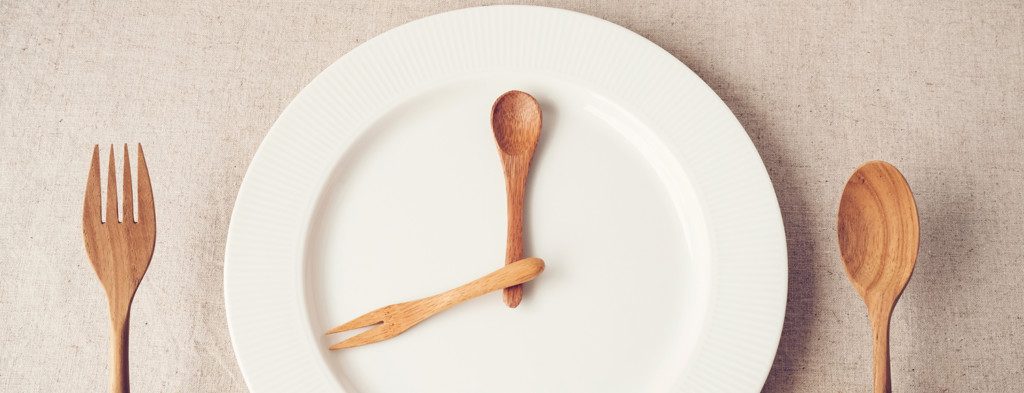 Wooden utensils on white plate