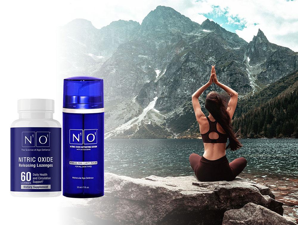 Woman meditating on a rock in front of a lake with N.O. Nitric Oxide Activating supplements graphic shown next to her