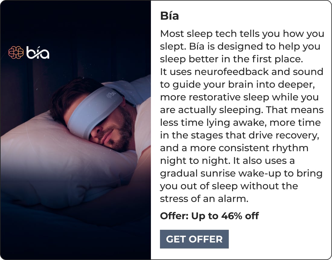 A man lies in bed wearing a white sleep mask device with a soft blue glow. Text beside him describes Bía, a biohacking product using neurofeedback and sound for better sleep, and offers up to 46% off with a Get Offer button.