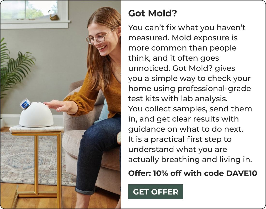 A smiling woman sits on a couch and uses a white mold testing device from Got Mold? on a table. Text explains how this biohacking product helps detect mold at home and includes a 10% off offer with the code DAVE10.