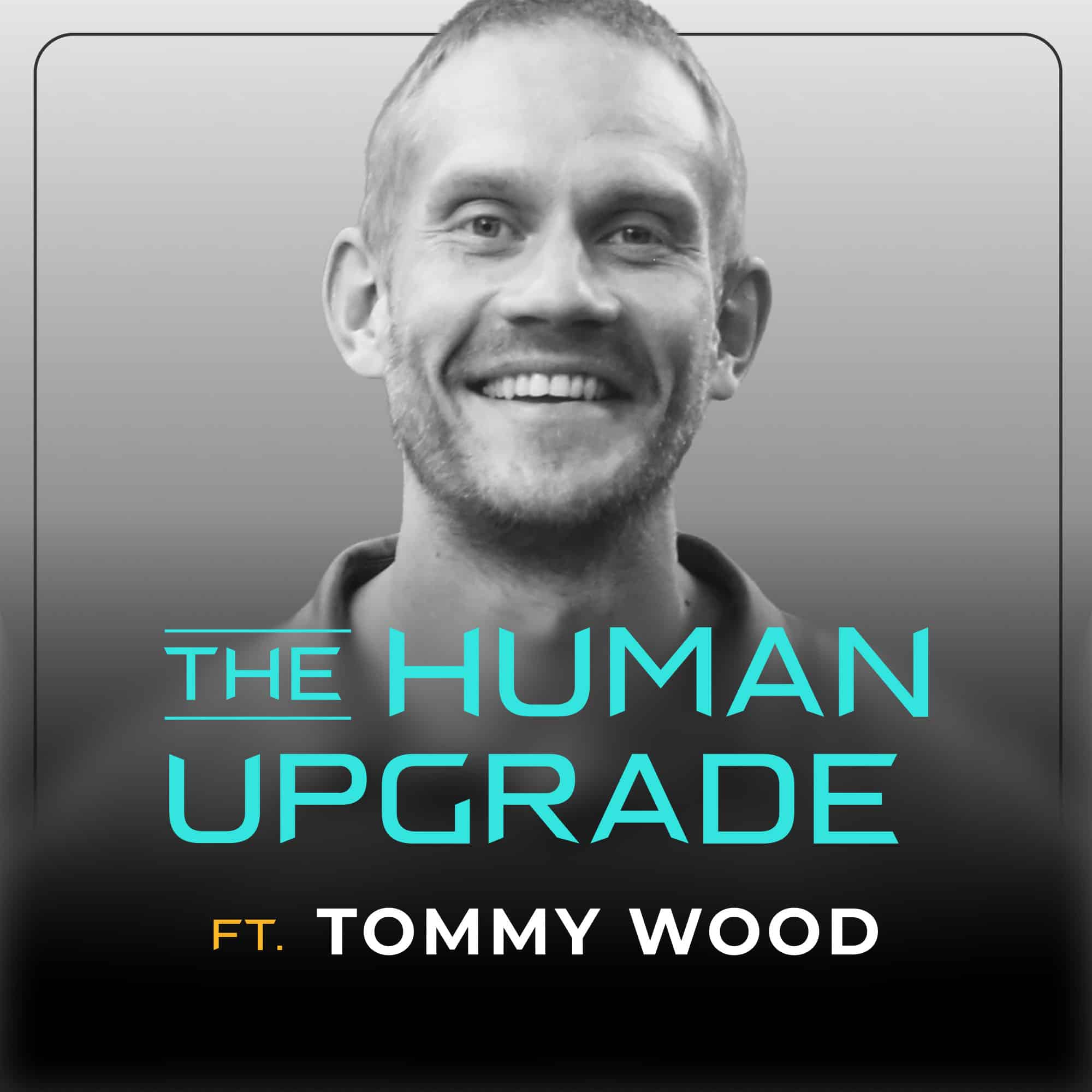 A smiling man in a grayscale image with the text The Human Upgrade ft. Tommy Wood in blue and white letters.