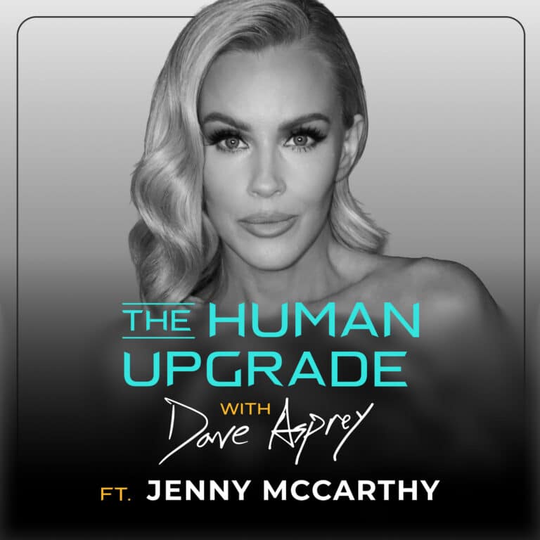 Black and white photo of a woman with wavy hair. Text: The Human Upgrade with Dave Asprey ft. Jenny McCarthy. The woman is looking directly at the camera with a neutral expression.