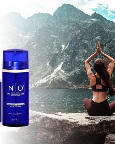 Woman meditating on a rock in front of a lake with N.O. Nitric Oxide Activating supplements graphic shown next to her