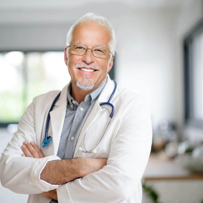 Portrait of mature doctor with eyeglasses
