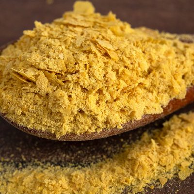 Nutritional yeast on a spoon