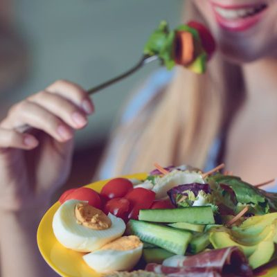woman eating a keto meal